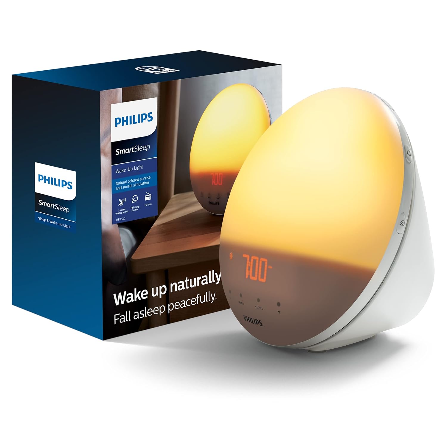 Philips SmartSleep wake-up light with sunrise glow on a nightstand